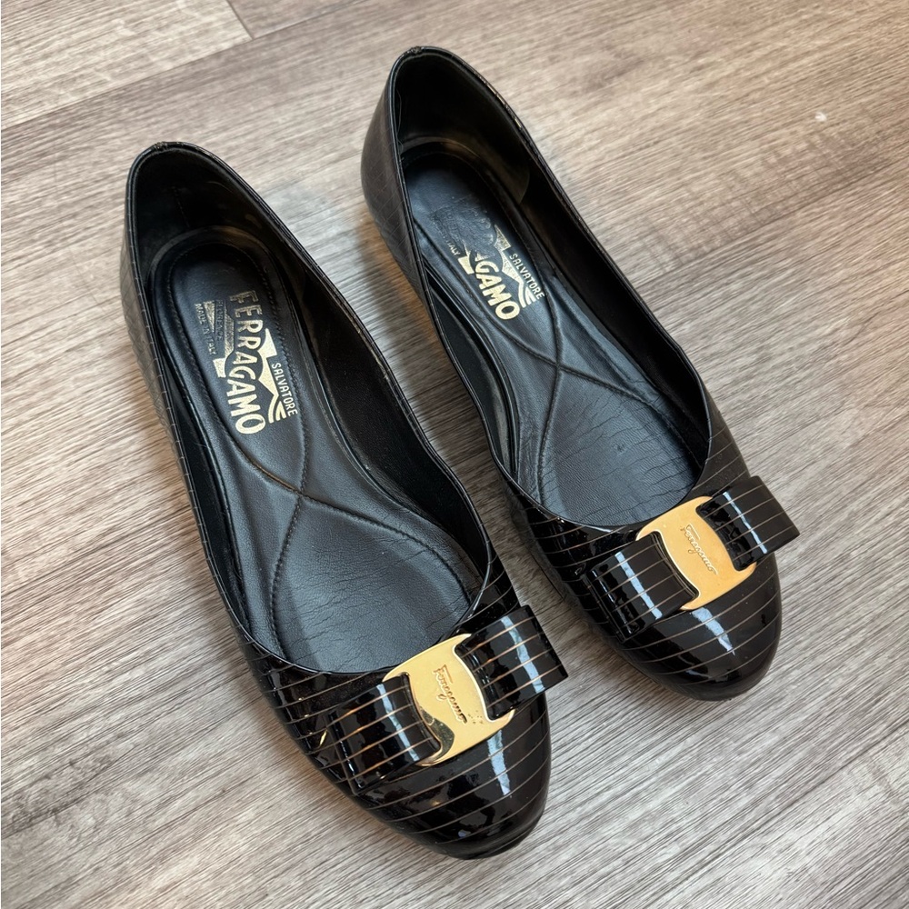 Salvatore Ferragamo Black Patent Flats with Gold Accent